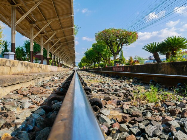 Low view railroad in the sunlight of the beautifulTrain station Lampang at Thailand