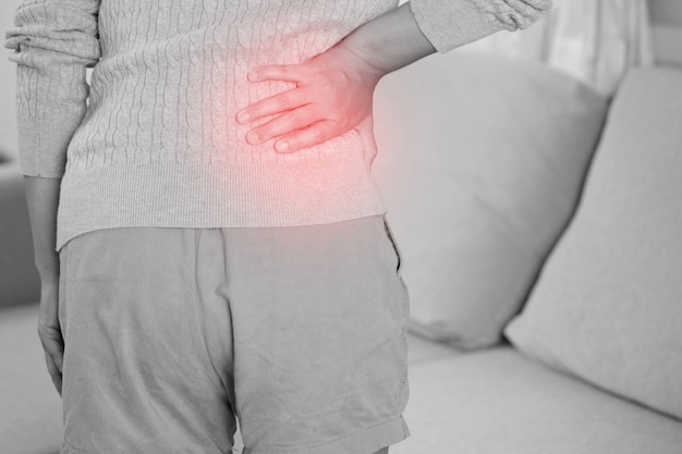 Lower back pain is usually caused by a muscle injury. broken\
pillow