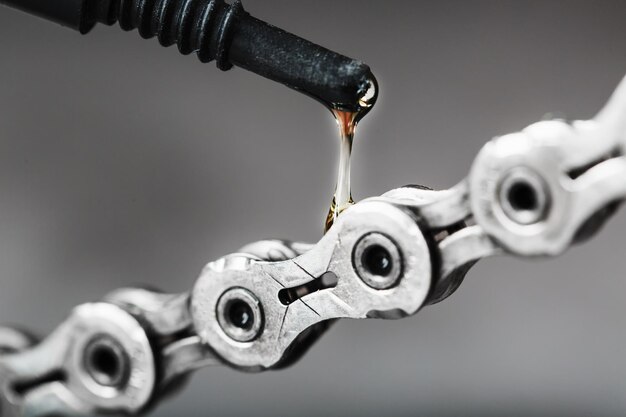 Lubricating a bicycle chain with a drop of oil