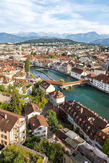 Lucerne city at Reuss river with Spreuerbrucke bridge from above portrait format traveling in Switzerland