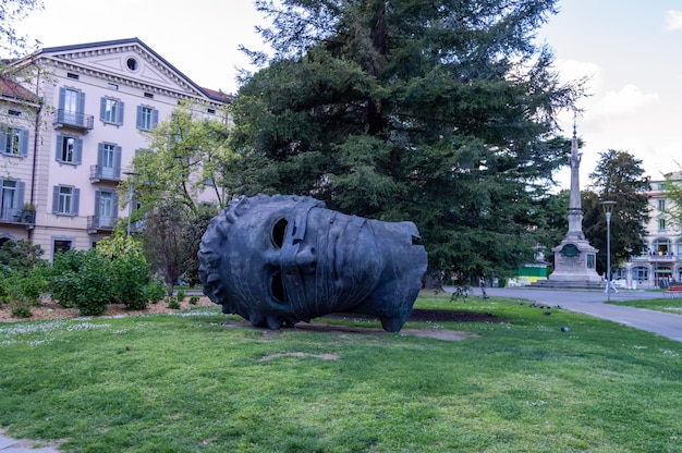 Lugano switzerland march 8 2023 famous monument shaped head called eros blindfolded artist igor mitora