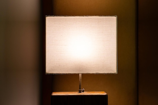 Luminous modern bedsides lamp at night