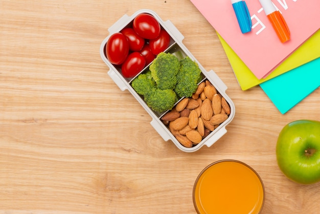 Lunch box and healthy food on isolated background