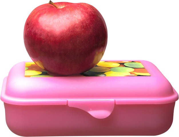 Коробка для завтрака и красное яблоко - изолированные