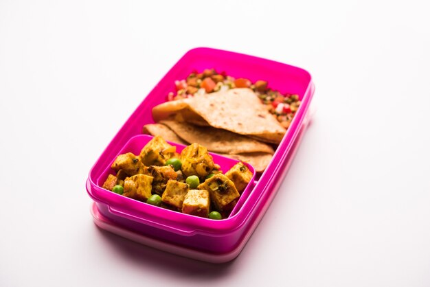 Lunch Box or Tiffin for Indian kids, hot Hot Paneer sabzi with roti or chapati, accompanied with sprouts