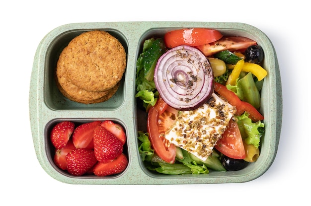 Photo lunch box with delicious food on a white background