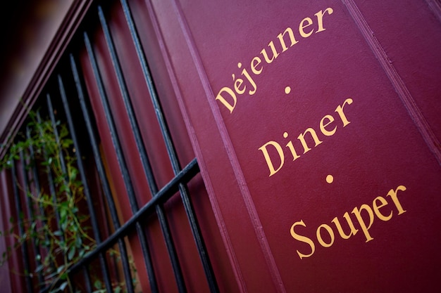 lunch dinner and supper on a wooden facade