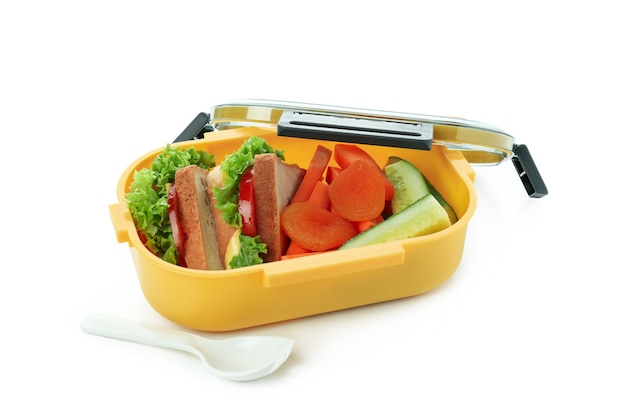 Lunchbox met lekker eten geïsoleerd op een witte achtergrond