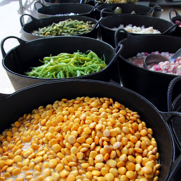 Lupins in pickles market with green chili pepper