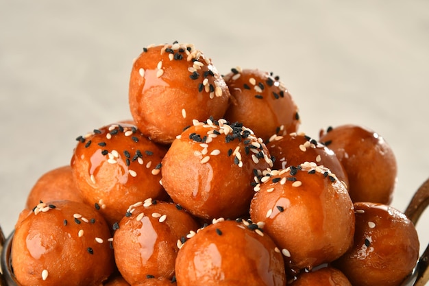 luqaimat or lokma. freshly fried lokma piled high a popular middle eastern dessert