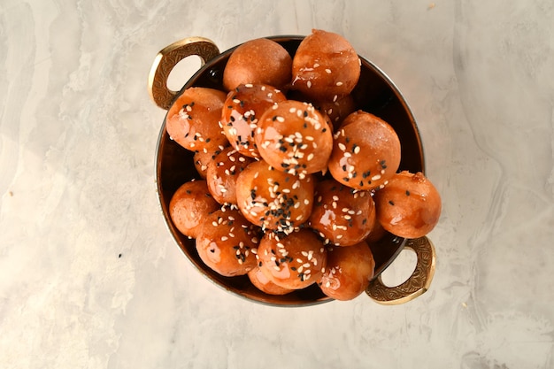 luqaimat or lokma. Freshly fried Lokma piled high a popular middle eastern dessert