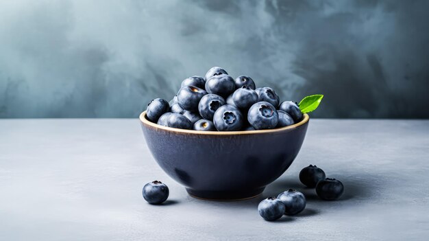 Luscious blueberries in a bowl on a light background