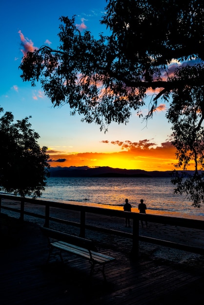 The lush colors of the sunset at Ponta do Sambaqui beach in FlorianÃ³polis, Santa Catarina, Brazil.