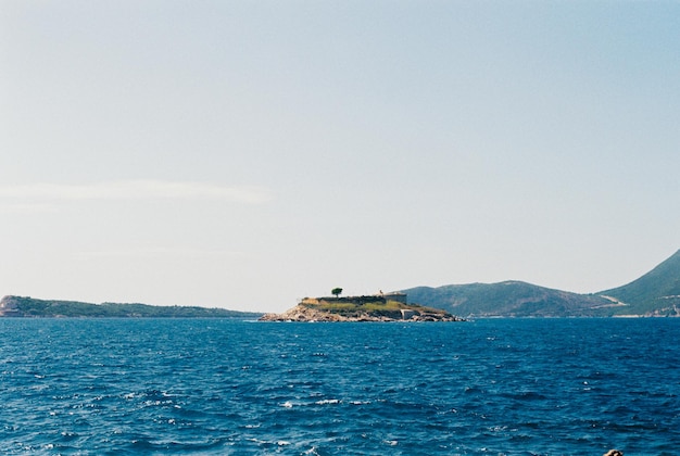 Lustica peninsula with arza fortress against the backdrop of mountains montenegro