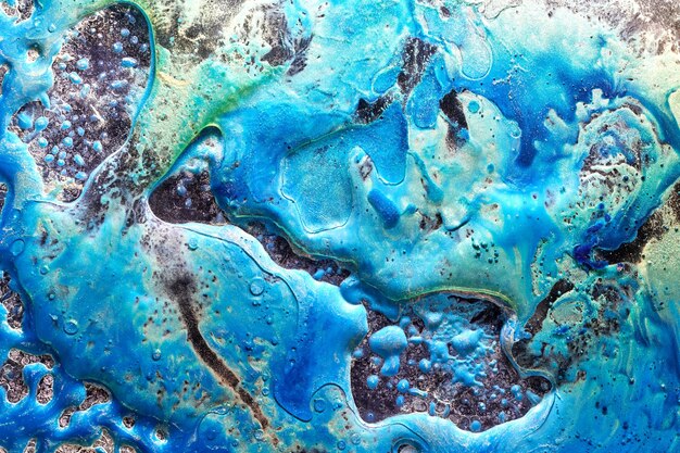 Luxe abstracte achtergrond vloeibare kunst Blauwe alcohol inkt met gouden verf strepen wateroppervlak marmeren textuur