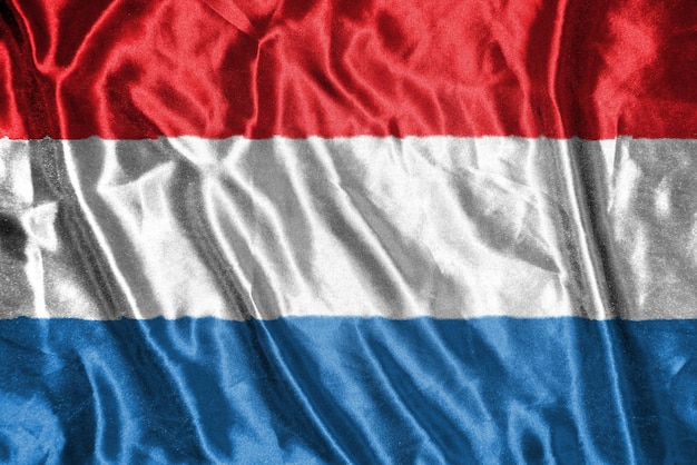 Photo luxembourg cloth flag satin flag waving fabric texture of the flag