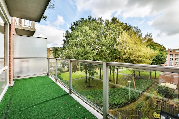 Luxurious balcony with artificial lawn