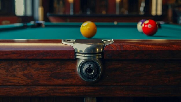 A luxurious billiard table with ornate corner detailing set in a warmly lit room featuring