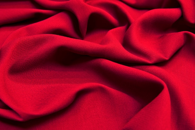 Luxurious draped wool fabric waves background