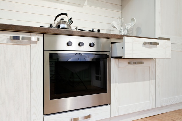 Luxurious new white  kitchen with modern appliances