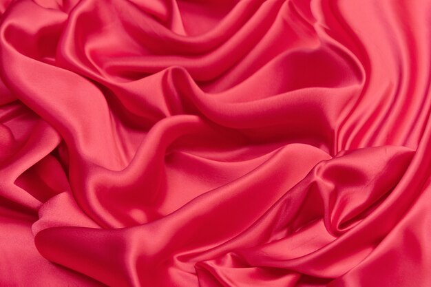 Luxurious satin fabric waves background