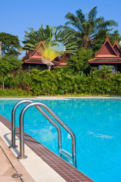 Luxurious swimming pool in a tropical garden