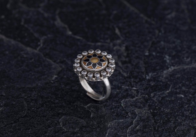 Luxury 925 Sterling Silver Ring on Vintage Black Background