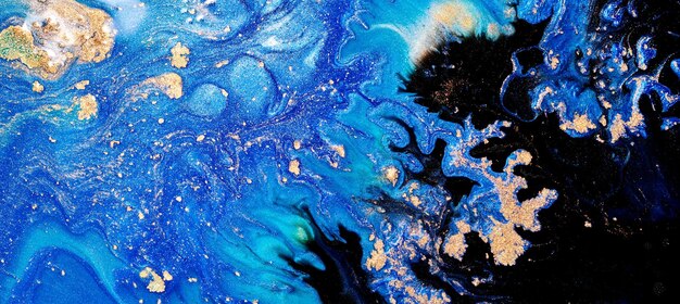 Luxury abstract background liquid art Blue alcohol ink with golden paint streaks water surface marble texture