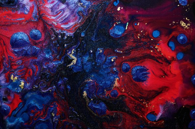 Luxury abstract background liquid art Blue red mix alcohol ink with golden paint blots Earth water surface marble texture