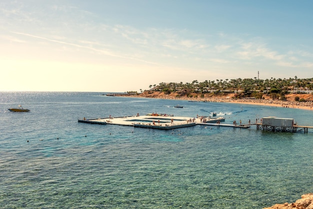 Luxury beach against the background of the beauty of the sea with coral reefs