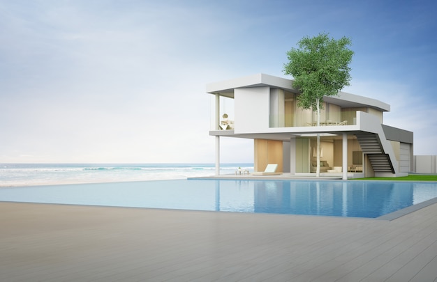 현대적인 디자인의 바다 전망 수영장과 테라스가있는 럭셔리 비치 하우스.