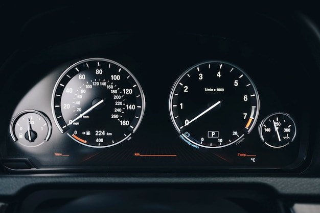 Luxury black car interior, information indicator panel in the
car's interior. details interior.