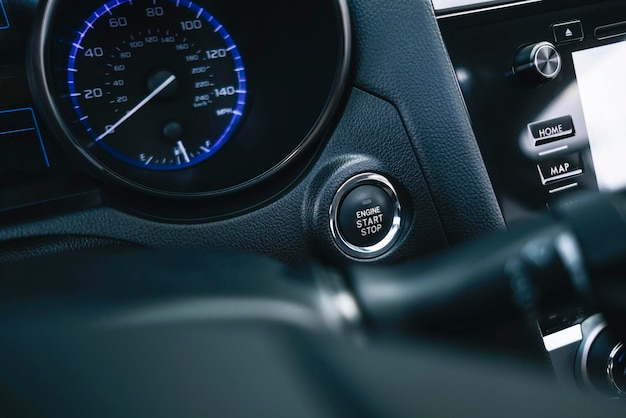 Luxury black car interior, information indicator panel in the car's interior. Details interior.