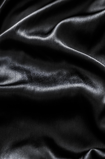 Luxury black soft silk flatlay background texture holiday glamour abstract backdrop