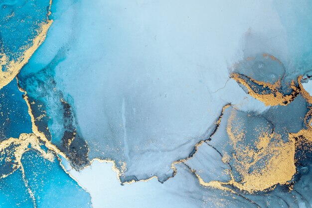 紙に大理石の液体インクアート絵画の豪華な青い抽象的な背景。