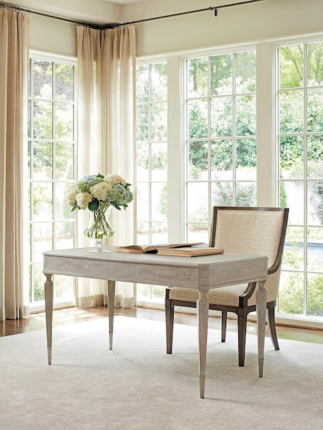 Luxury cabinet with wooden table and big windows