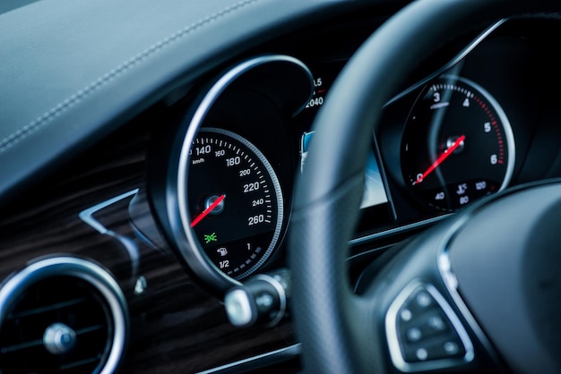 Luxury car interior details Speedometer steering wheell