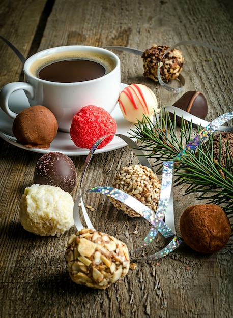 Luxury chocolate candies and cup of coffee