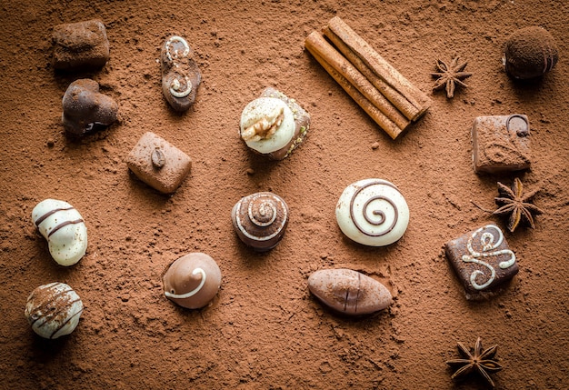 Luxury chocolate candies with cocoa powder