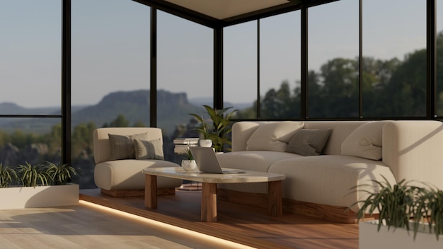 Роскошная современная гостиная с журнальным столиком на диване и стеклянной стеной с видом на природу