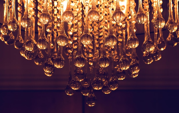 Photo luxury crystal chandelier in the house