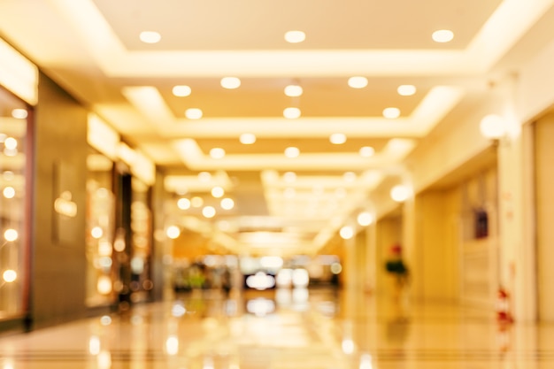 Luxury department store shopping mall interior, abstract defocused blur with bokeh background, concept of shopping seasons design