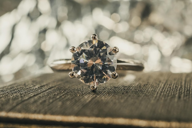 Luxury engagement Diamond ring with abstract bokeh light background