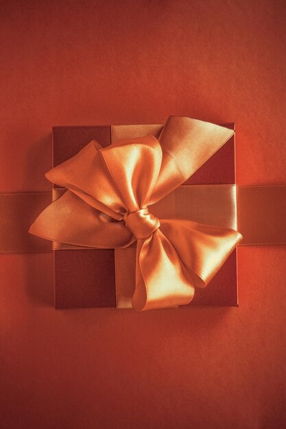 Luxury gifts with golden bow as holiday background Valentines Day presents surprise