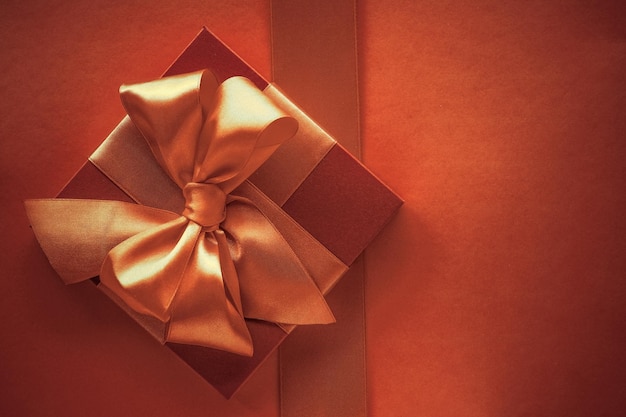 Luxury gifts with golden bow as holiday background Valentines Day presents surprise