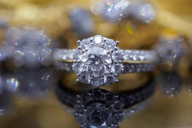 Luxury gold jewelry diamond rings with reflection on black\
background