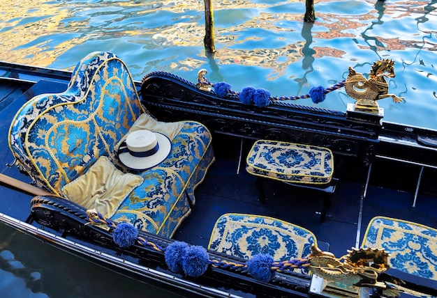 Luxury gondola waiting for tourists near rialto bridge in venice