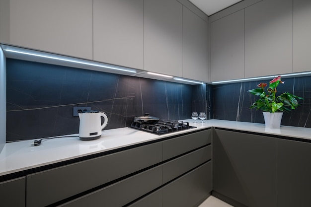 Luxury grey white and blue kitchen details in the corner