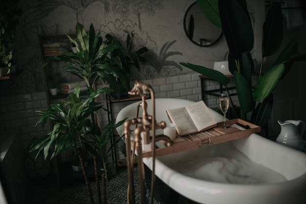 Luxury interior of big bathroom at modern african style with oval bathtub in natural lighting