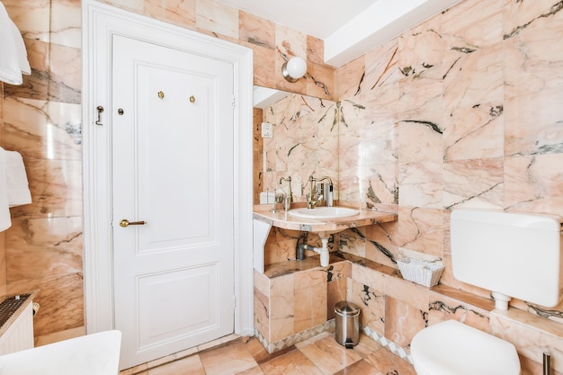 Luxury interior design of a bathroom with marble walls